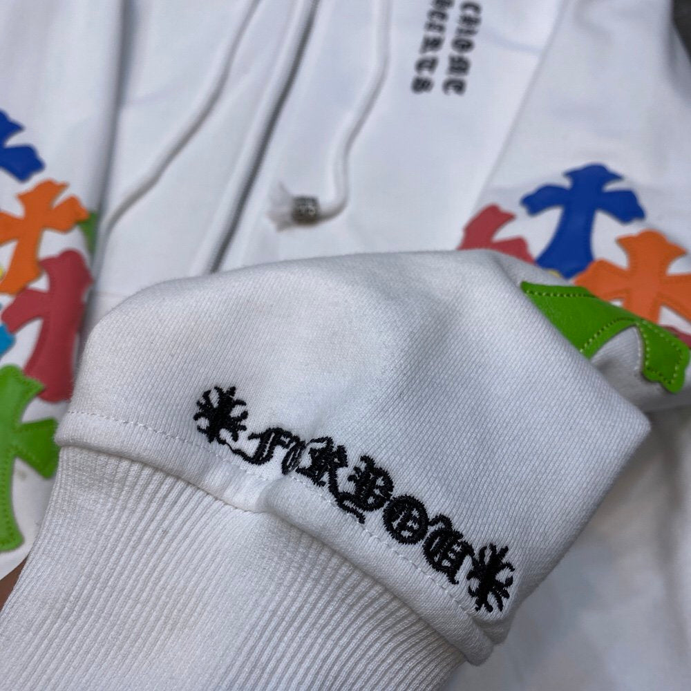 White chrome hearts jacket with colorful crosses