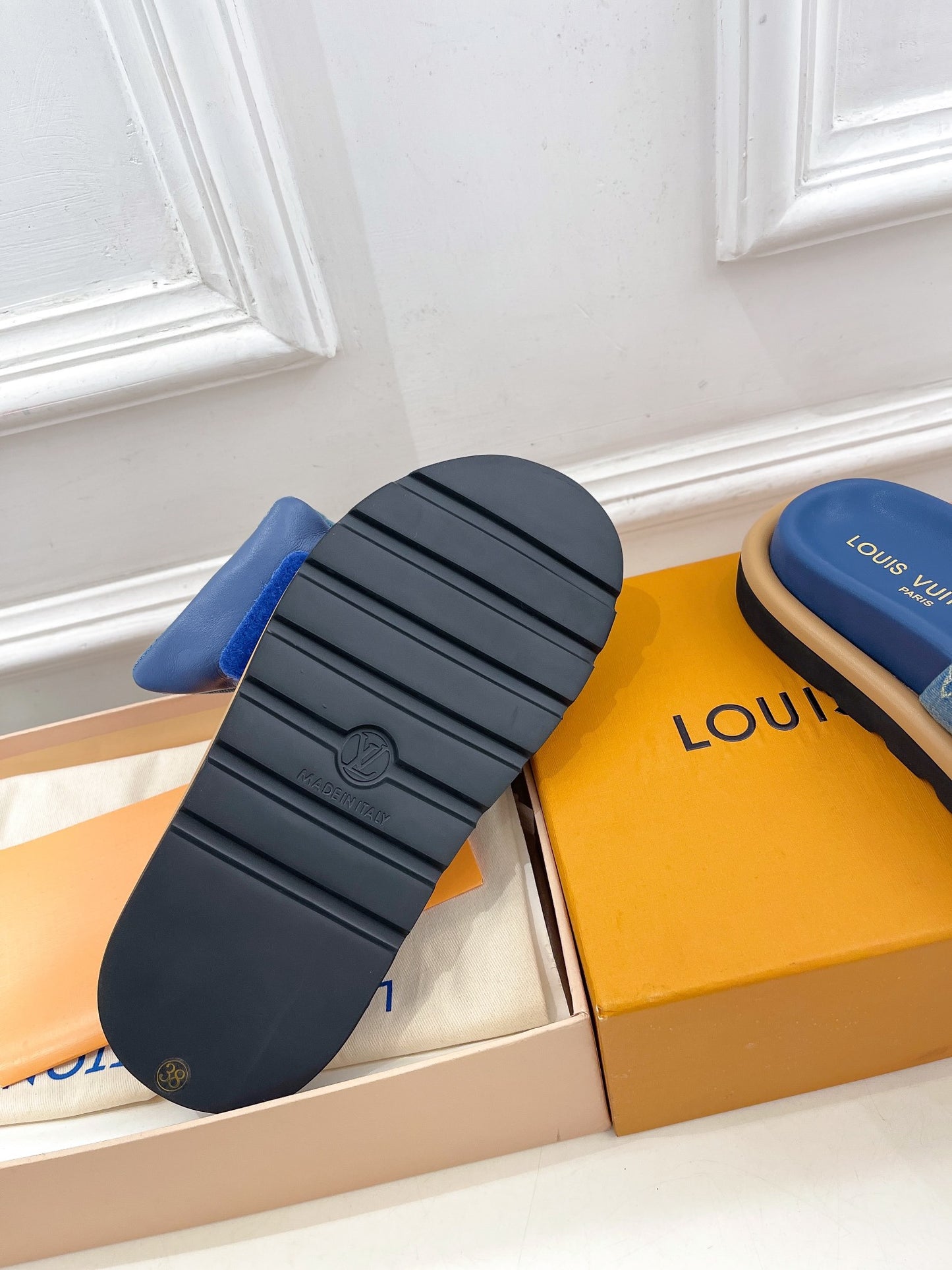 Dark blue Louis Vuitton slides