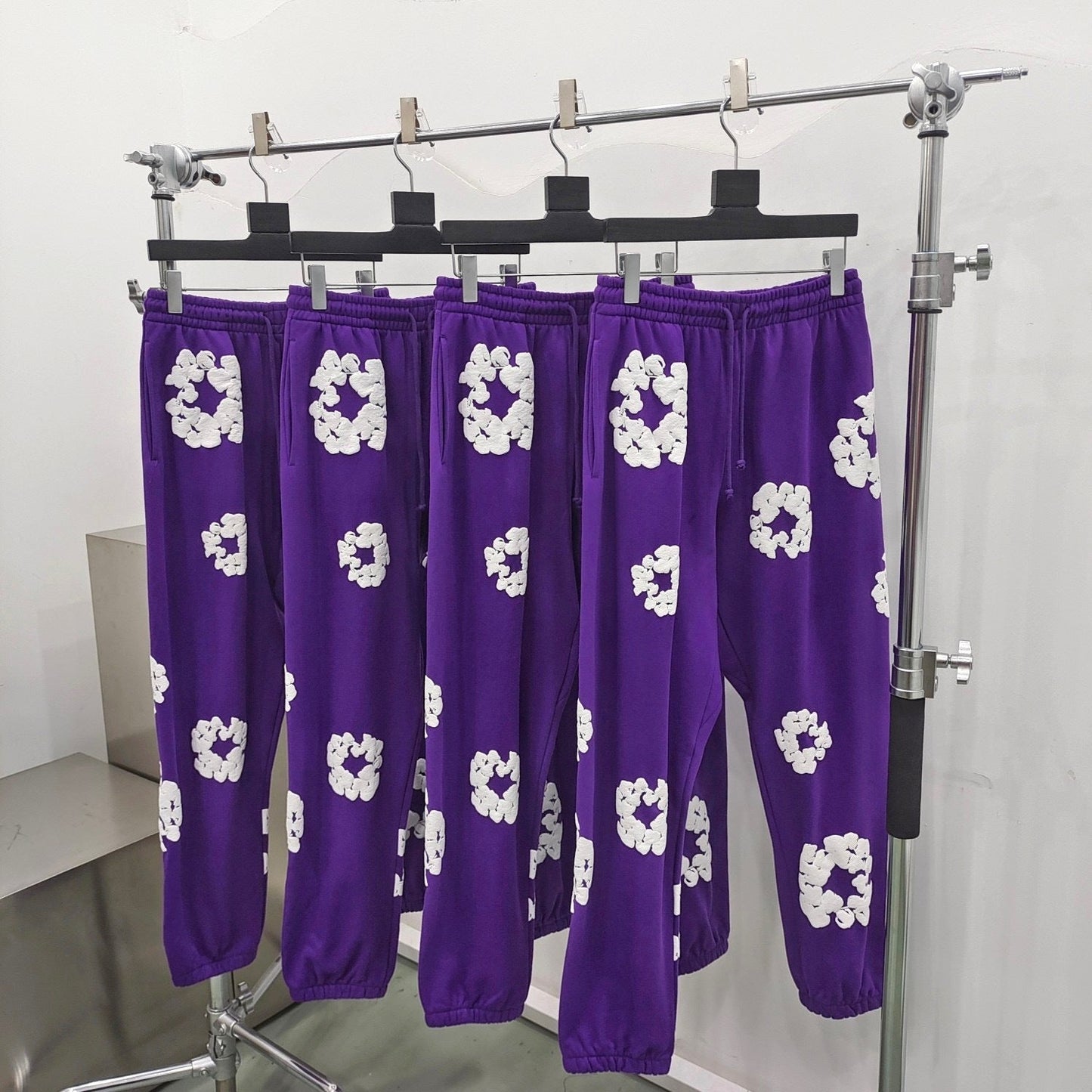 Purple denim tears sweatpants