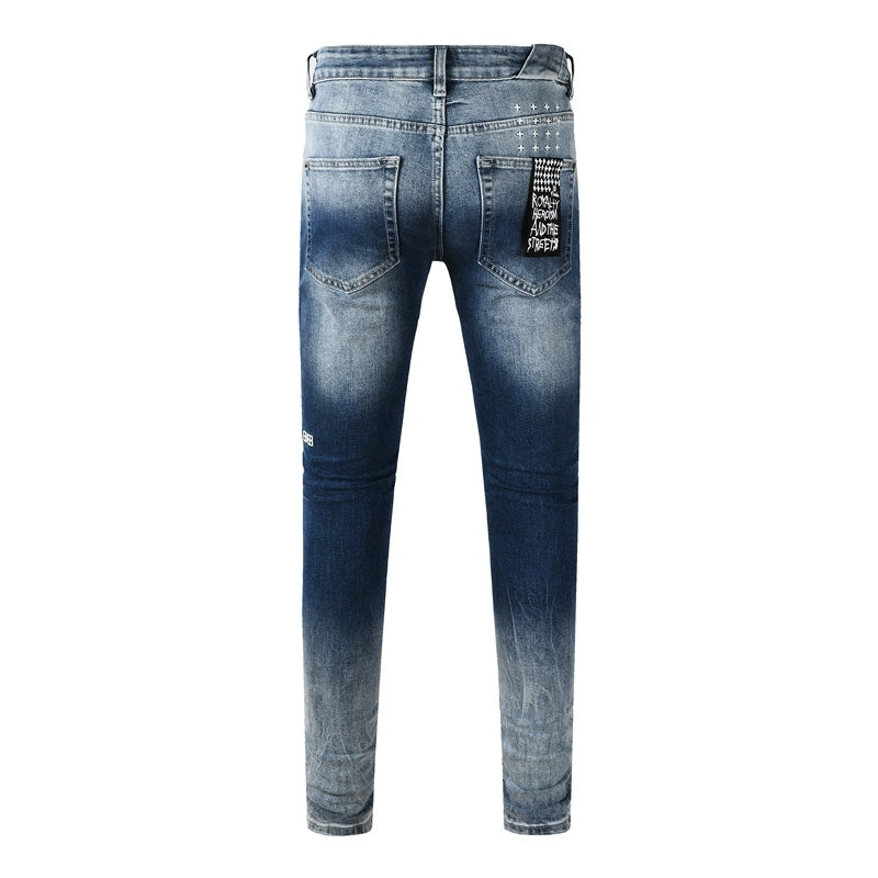 KSUBI denim dark blue lightly distressed skinny jeans with white writing