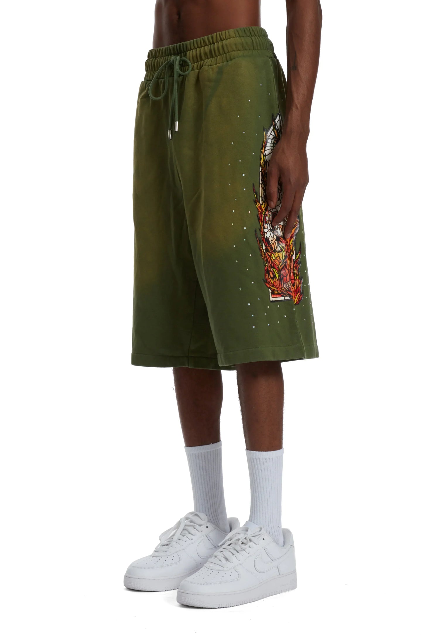 WHO DECIDES WAR green flame glass shorts