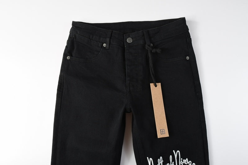 KSUBI denim black skinny jeans with writing