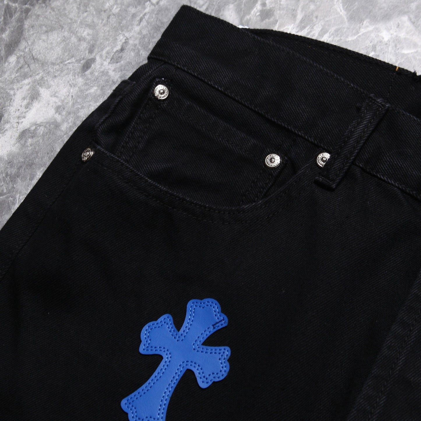 Chrome hearts jeans with colorful crosses