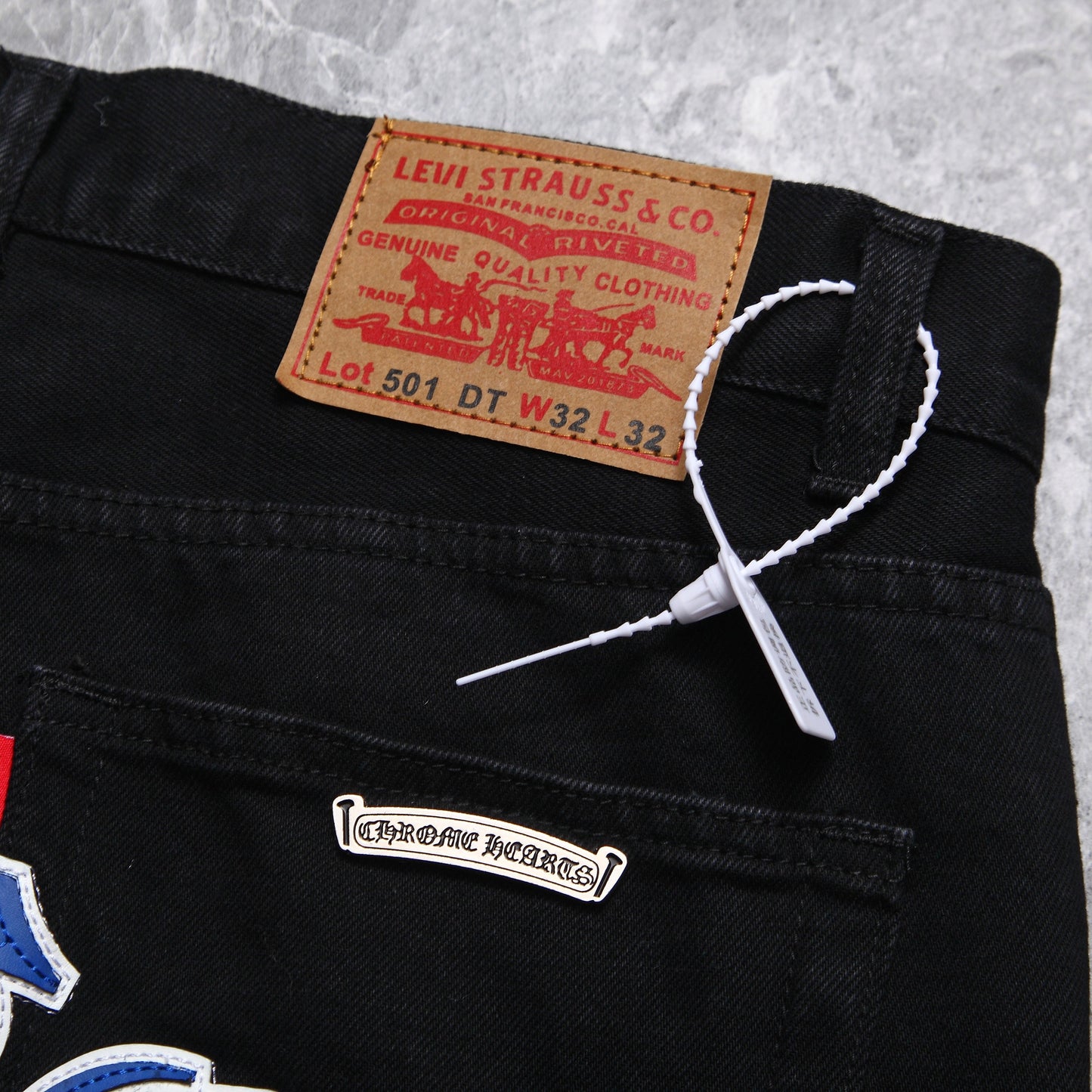 Chrome hearts jeans with colorful crosses