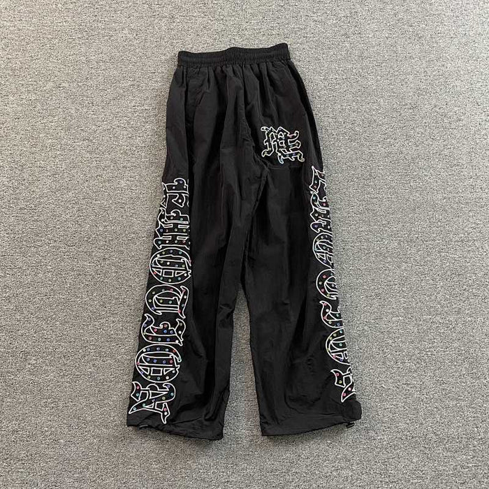 MIXED EMOTION RHINESTONE NAYLON TRACK PANTS