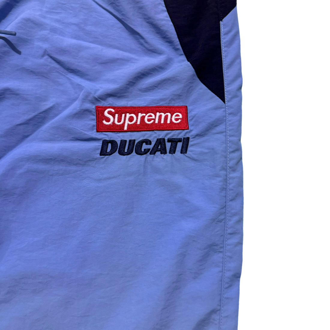 Supreme Ducati track pants black and blue