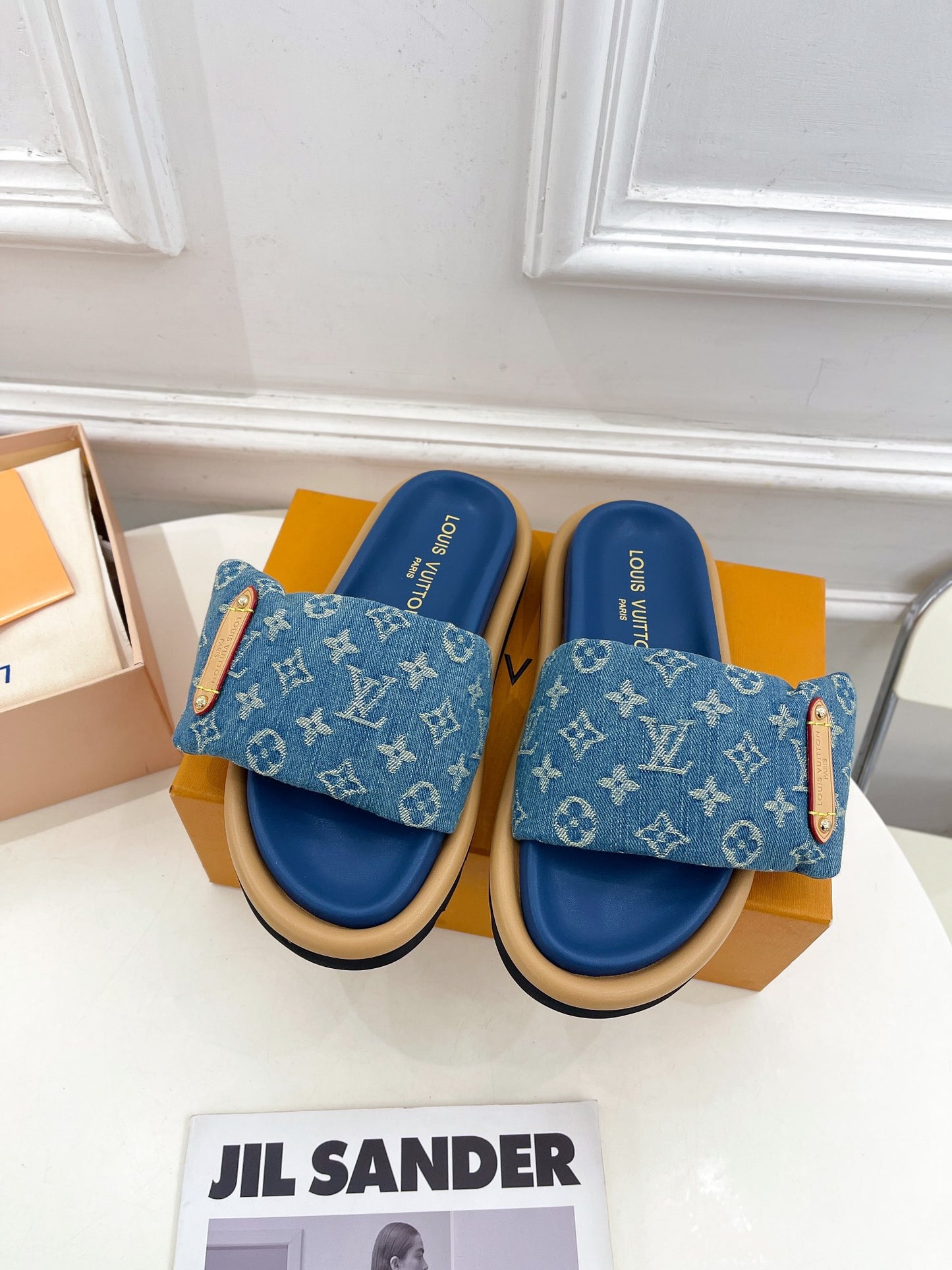 Dark blue Louis Vuitton slides