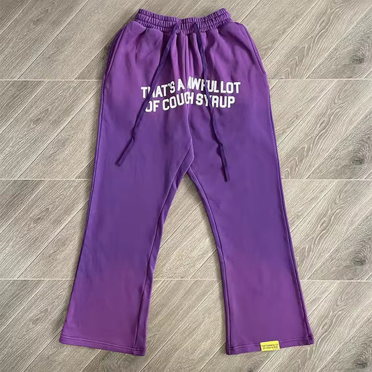 Purple that’s awful lotta cough syrup sweatpants