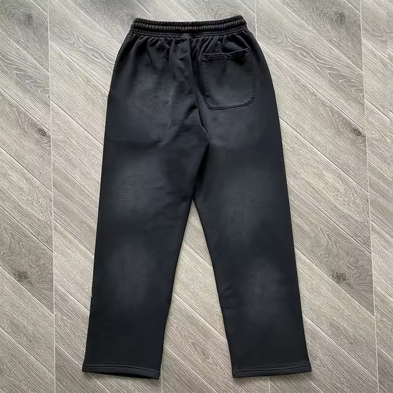 Black and green Hellstar sweatpants