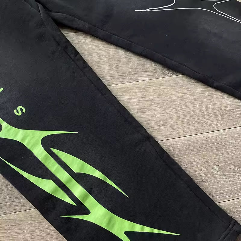 Black and green Hellstar sweatpants