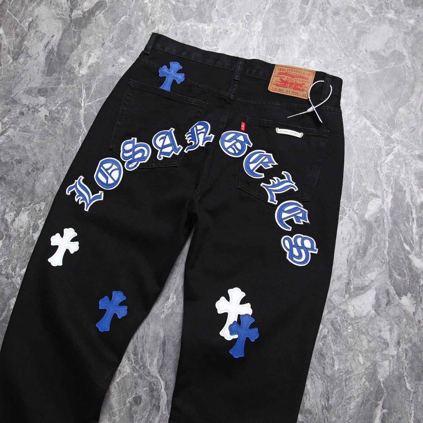 Chrome hearts jeans with colorful crosses