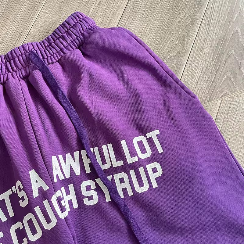 Purple that’s awful lotta cough syrup sweatpants