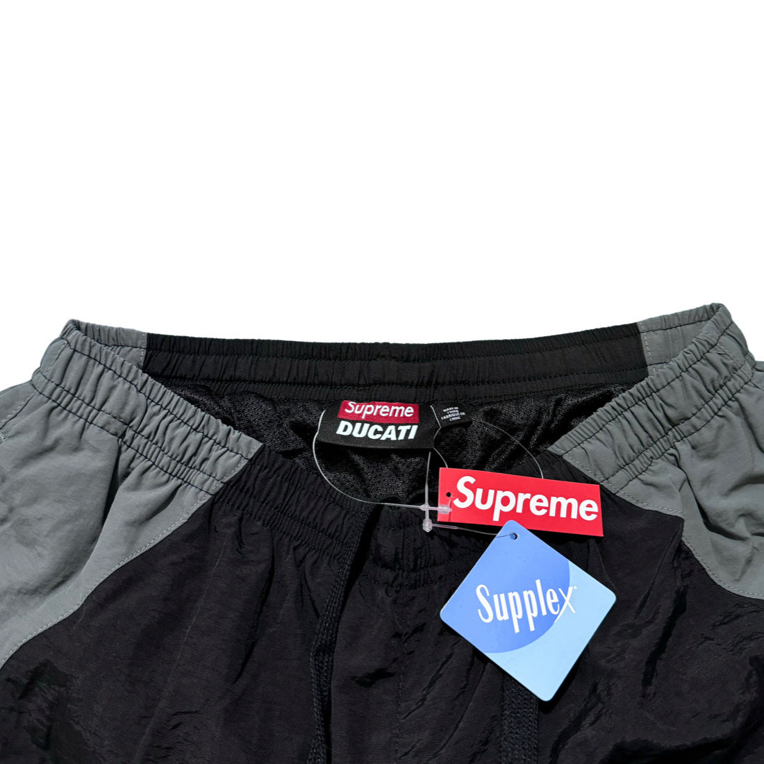Supreme Ducati track pants black gray and red