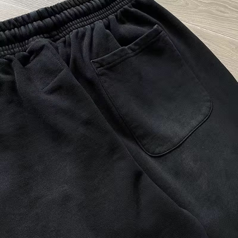 Black and green Hellstar sweatpants