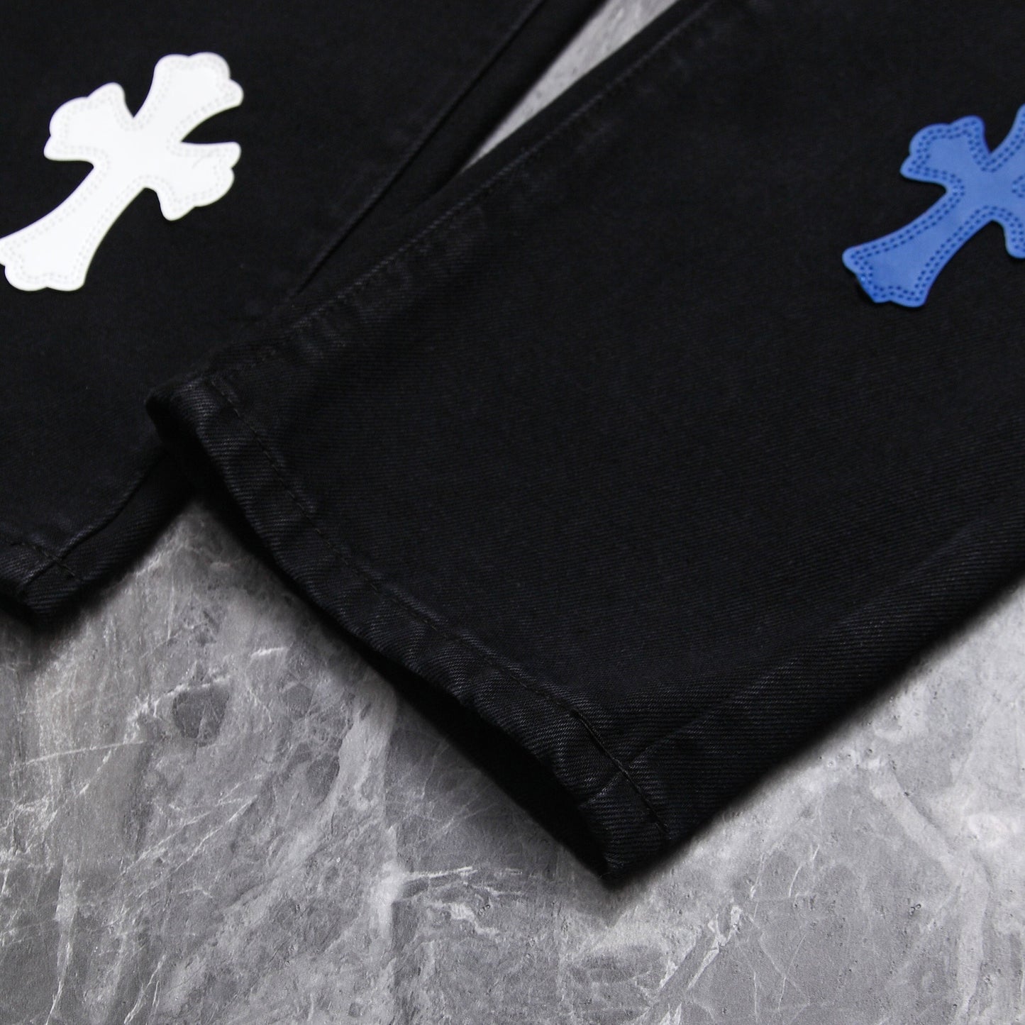 Chrome hearts jeans with colorful crosses