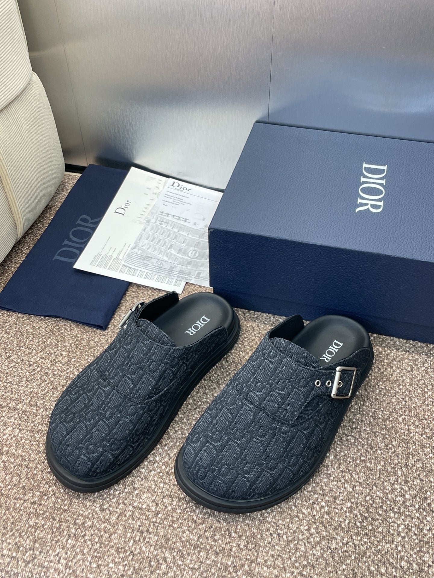 Black Dior loafer clogs
