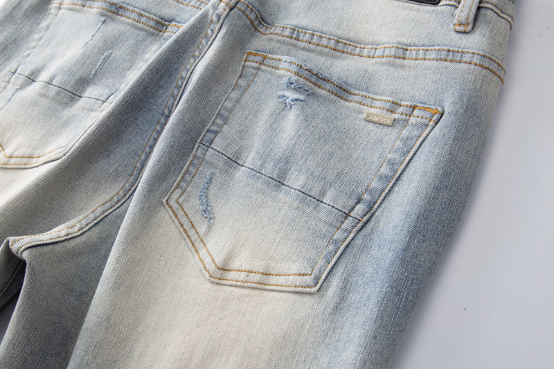 Amiri jeans light gray distressed