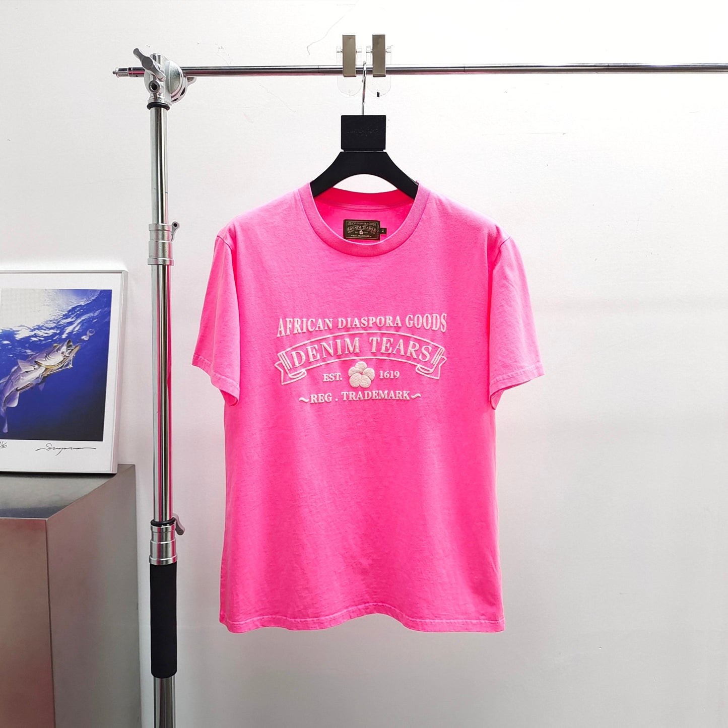 Pink denim tears tee