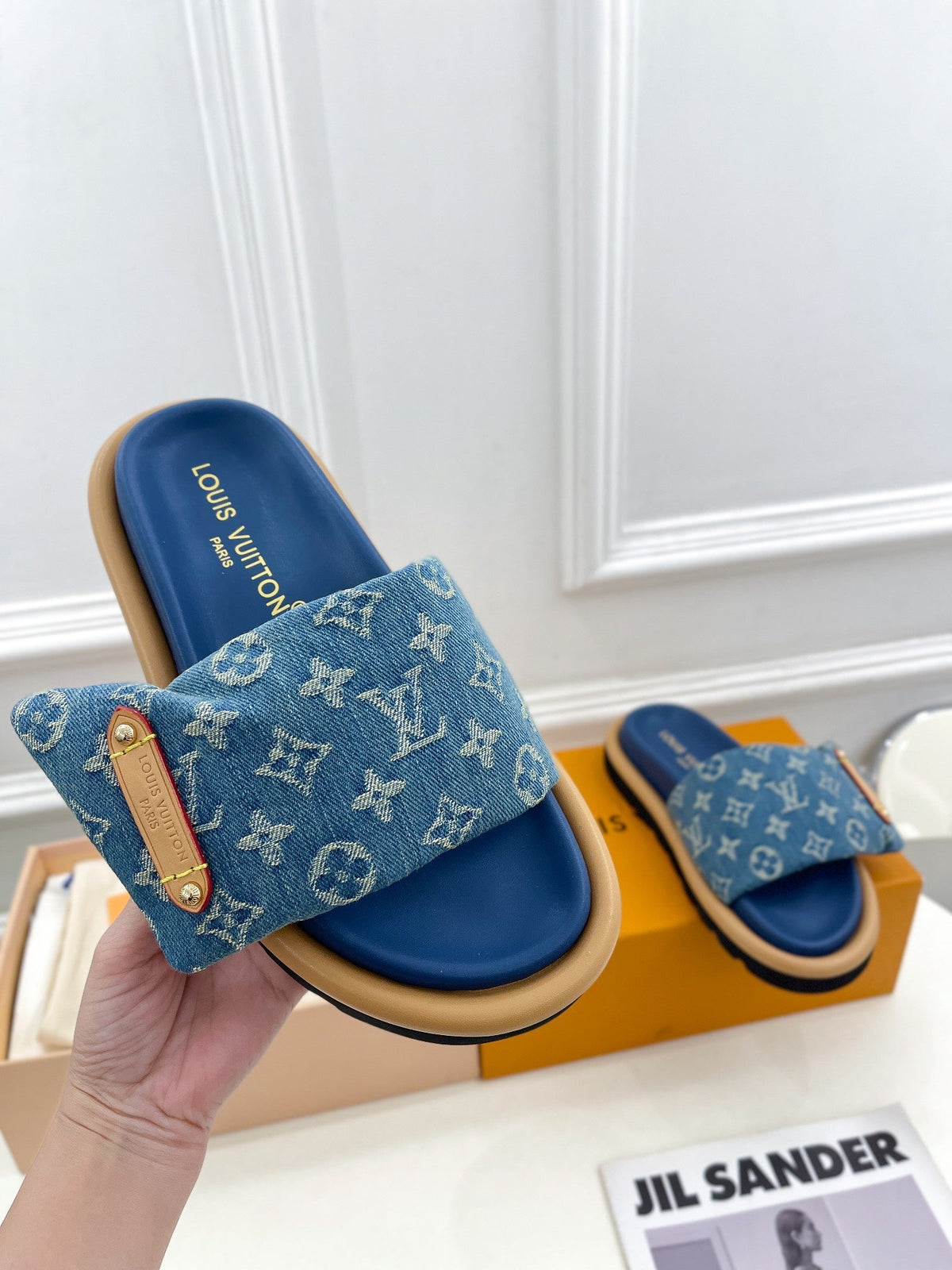 Dark blue Louis Vuitton slides