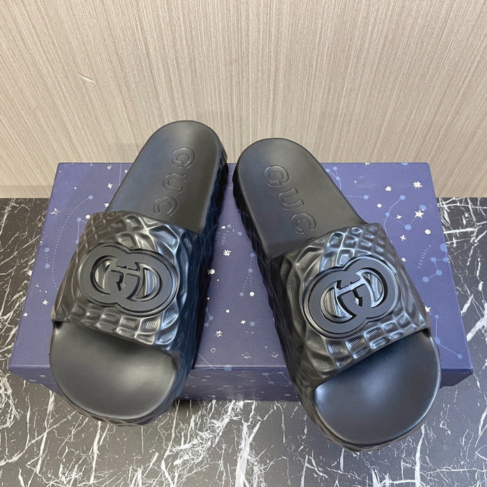 Black Gucci slides