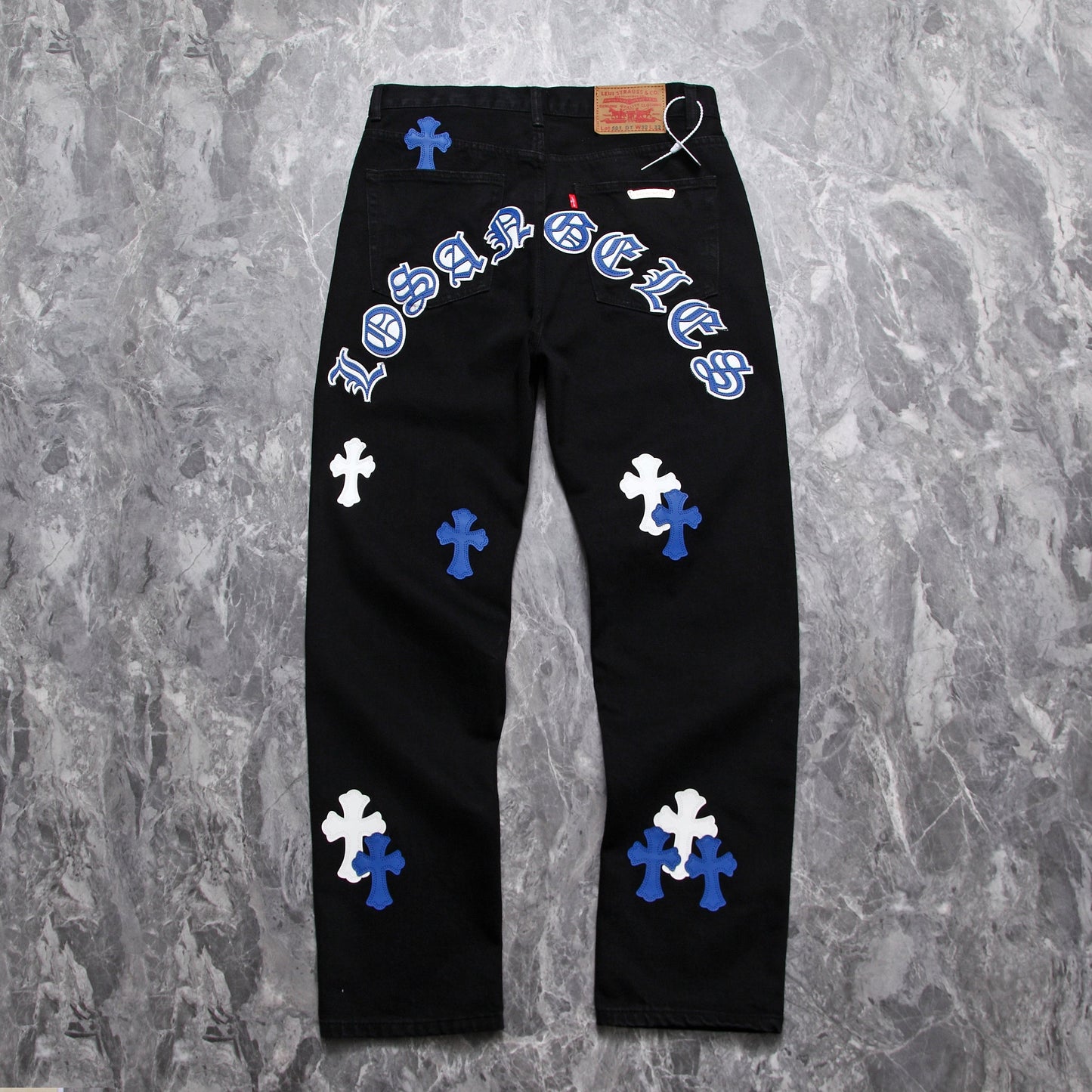 Chrome hearts jeans with colorful crosses