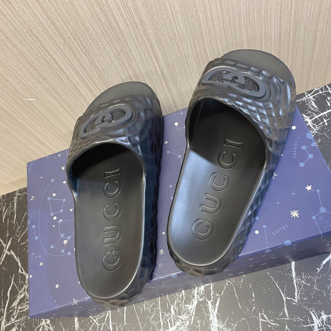 Black Gucci slides