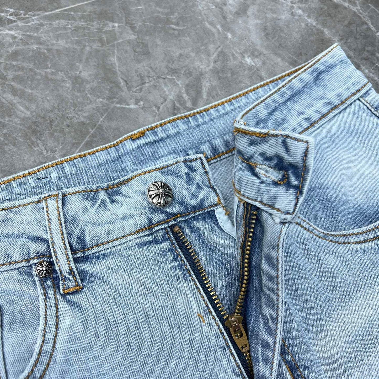 Chrome hearts jorts with blue and yellow crosses