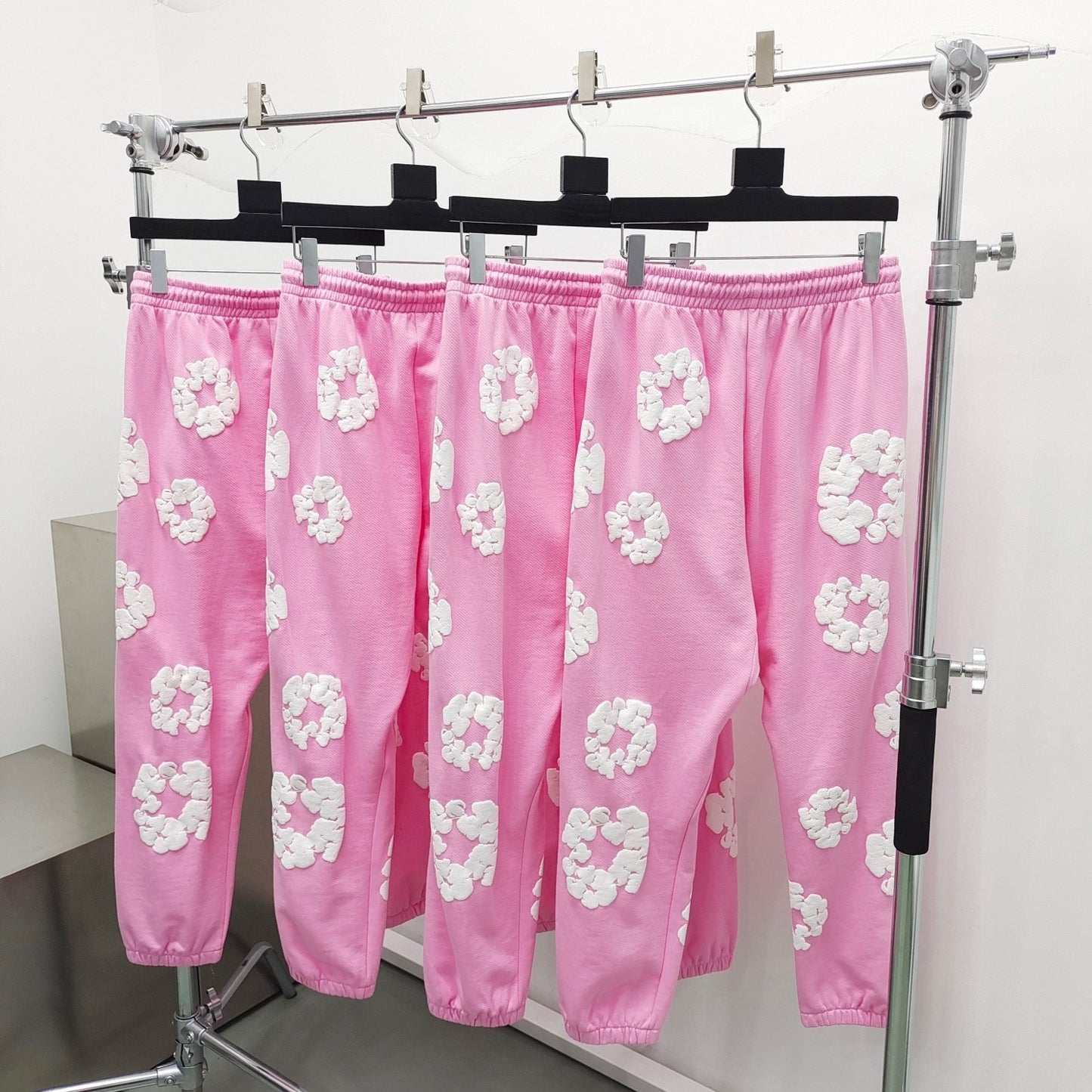 Pink denim tears sweatpants