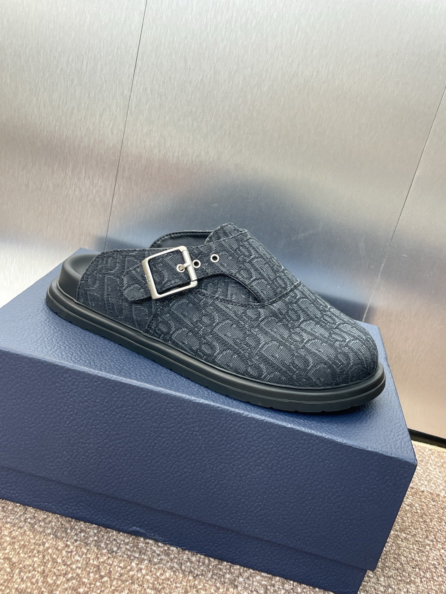 Black Dior loafer clogs