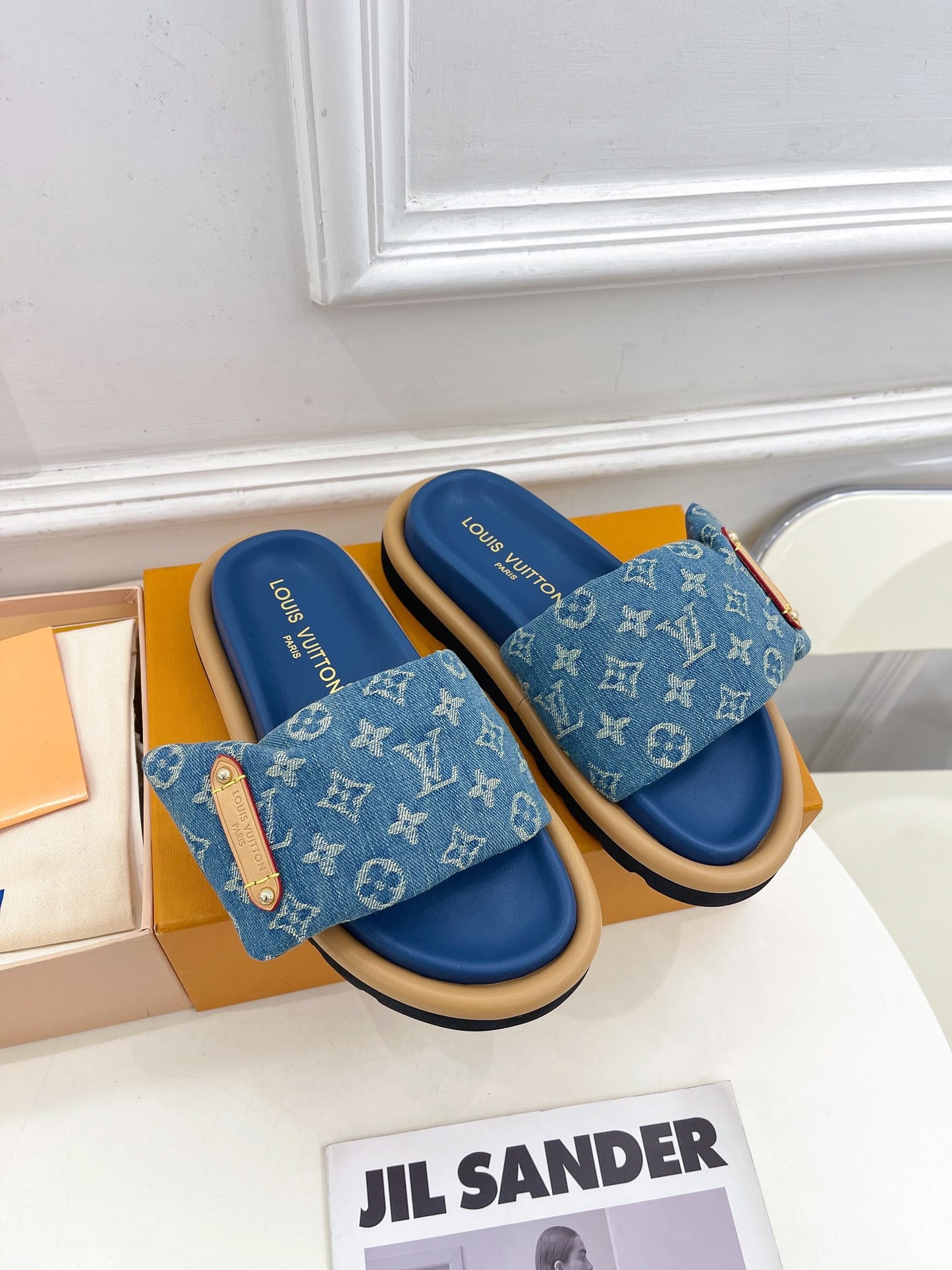 Dark blue Louis Vuitton slides