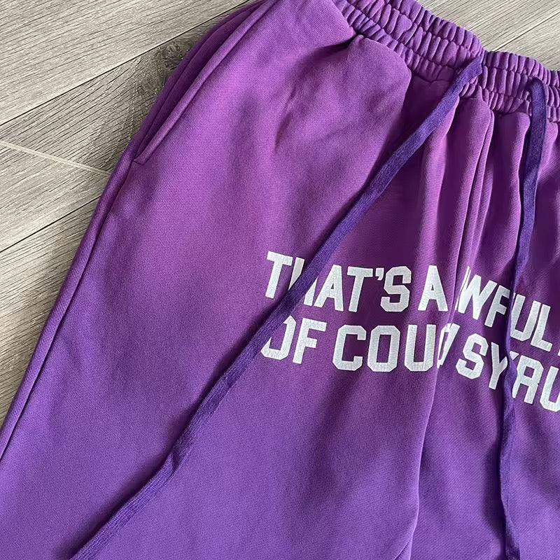 Purple that’s awful lotta cough syrup sweatpants