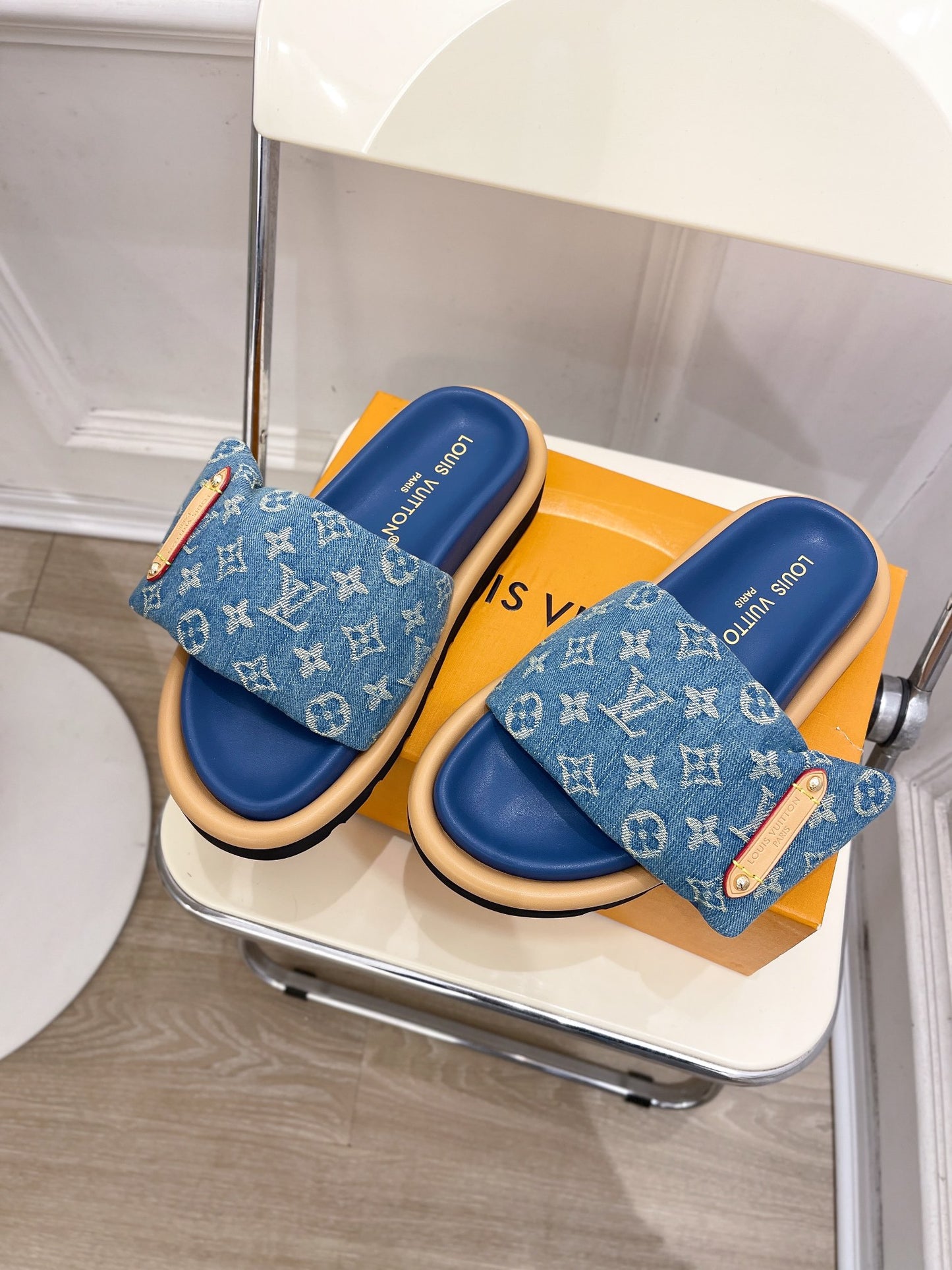 Dark blue Louis Vuitton slides